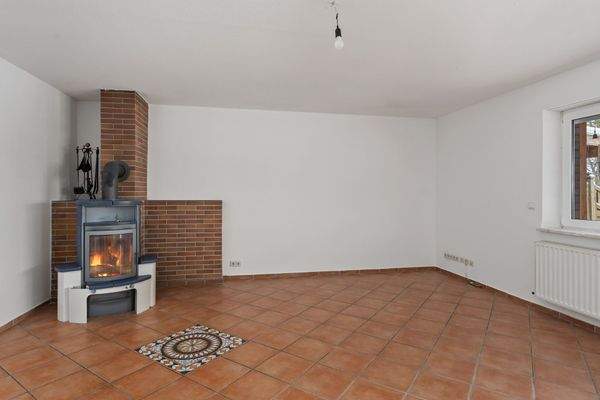 Wohnzimmer mit Kaminofen im Erdgeschoss 30,70m²