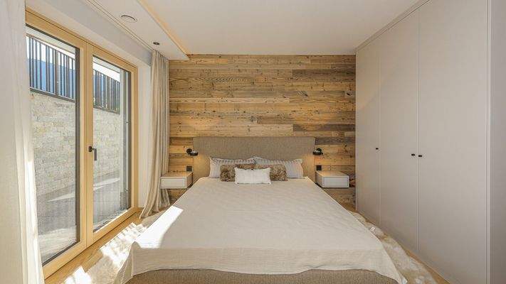 KITZIMMO-Luxuriöse Gartenwohnung mit eigenem Wellnessbereich - Immobilien Brixen.