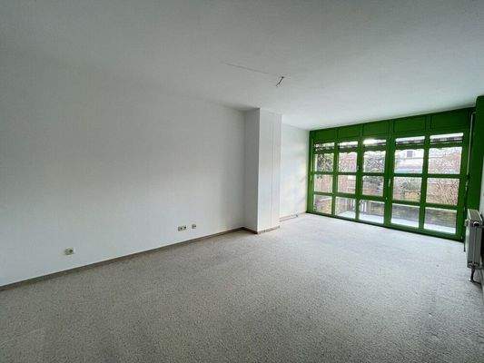 Wohnzimmer mit Ausgang auf die Terrasse