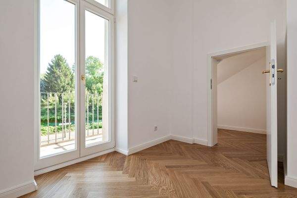 Schlafzimmer mit Balkon