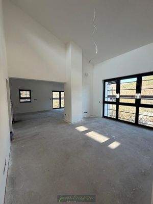 Wohnlounge mit Blick zur Küche