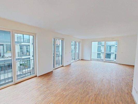 Ansicht II: Wohn- und Esszimmer mit offenem Küchenbereich