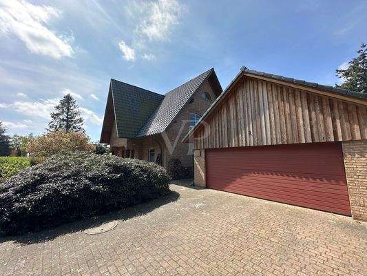 Haus mit Garage/Werkstatt