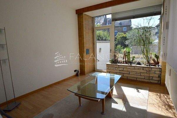 Wohnzimmer mit Sonnenbalkon Wohnung OG