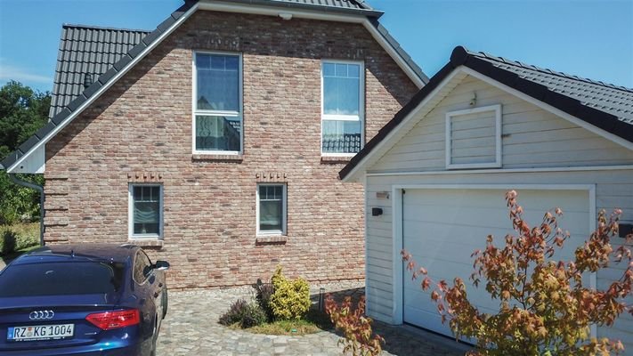 Garage plus Extrastellplatz