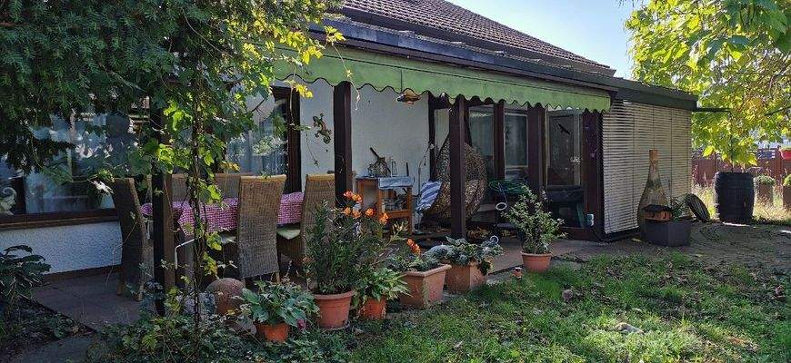 Überdachte Terrasse und Wintergarten