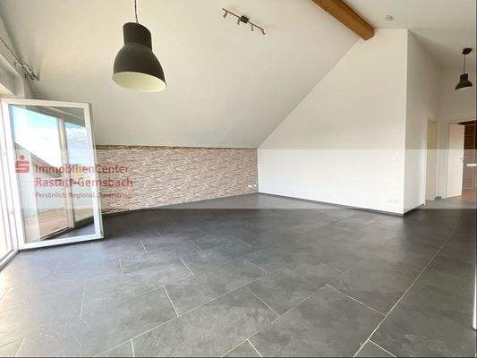 Wohnbereich mit Ausganz auf den Balkon