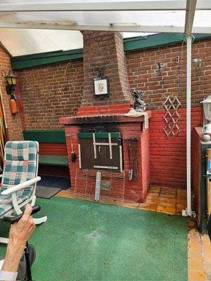 Überdachte Terrasse m. Kamin