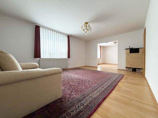 EG: Im Wohnzimmer genießen Sie die Freizeit mit Ihrer Familie