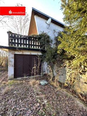 Gartenhaus mit Garage und Balkon