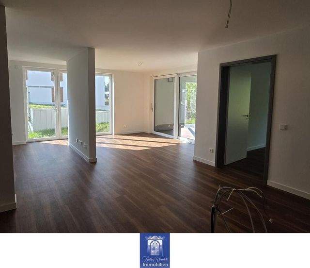 Stilvolles Wohnen im Neubau! Ruhig und grün, Terrasse, 2 Bäder, Fußbodenheizung! - Photo 2