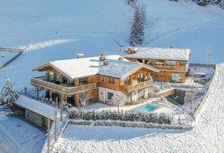 KITZIMMO-Luxuswohnung mit Pool in Toplage kaufen - Immobilie Jochberg.