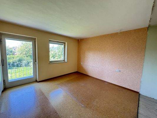 Elternschlafzimmer mit Zugang zum Balkon