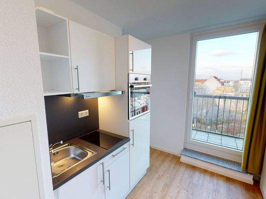 Ansicht II: Eingangs- und Küchenbereich