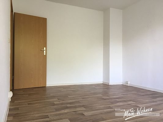 Wohnzimmer mit Balkon