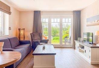 Wohnbereich mit Zugang zur Terrasse