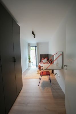 Schlafzimmer mit Balkon