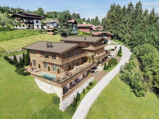 Zwei trendige Chalets in Toplage