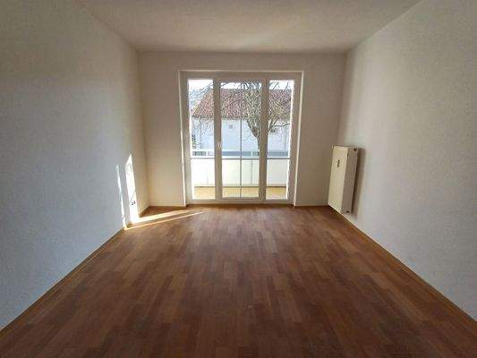 Wohnzimmer mit Balkon