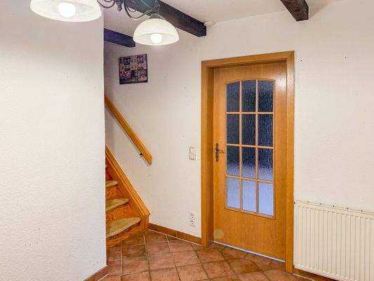 Flur mit Aufgang zum Obergeschoss
