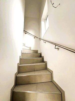 Treppe ins Obergeschoss