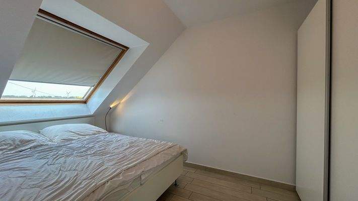 Schlafzimmer im Spitzboden