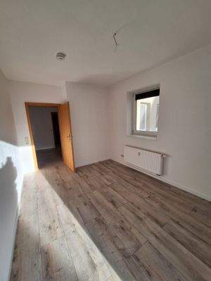 Durchgangszimmer zum Balkon