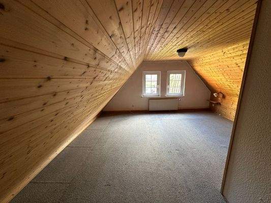 Schlafzimmer zwei im Dachgeschoss mit Badezimmer