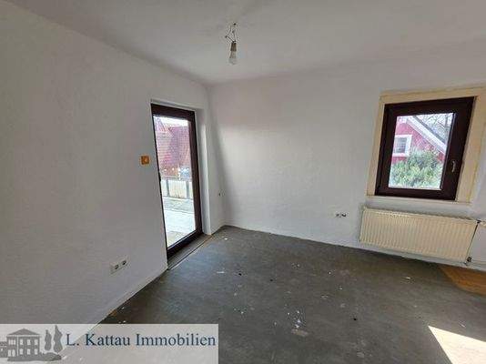 Schlafzimmer mit Zugang zur Dachterrasse