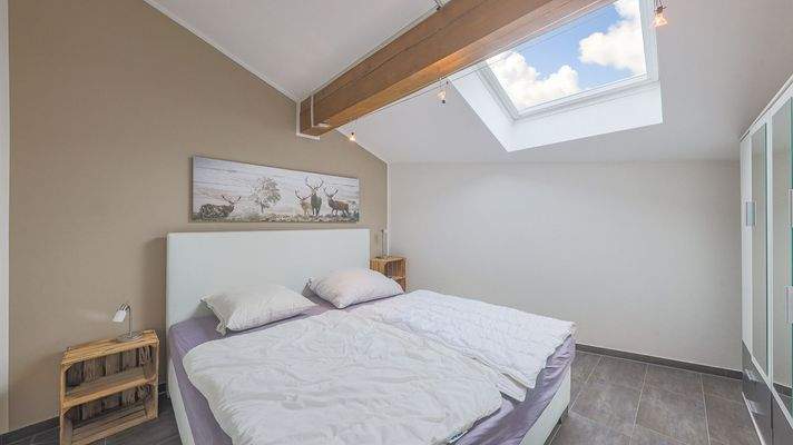 KITZIMMO-exklusive Dachgeschosswohnung kaufen - Immobilien Kitzbühel.