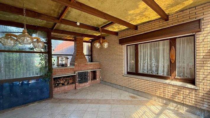 Wintergarten mit Kamin