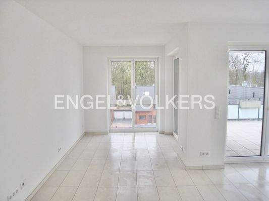 Wohn- und Essbereich mit Zugang zur Südterrasse