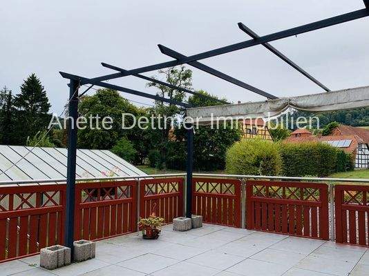 Balkon mit Treppe zum Garten