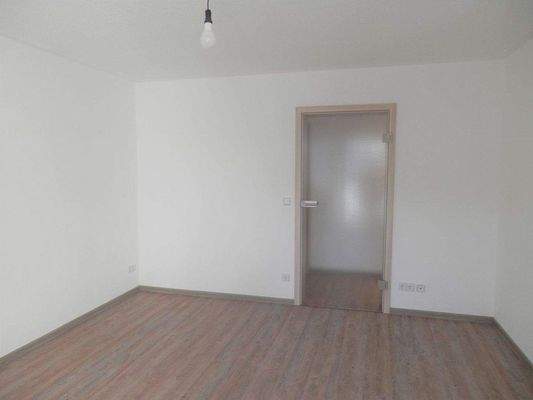 Wohnzimmer mit Glastür