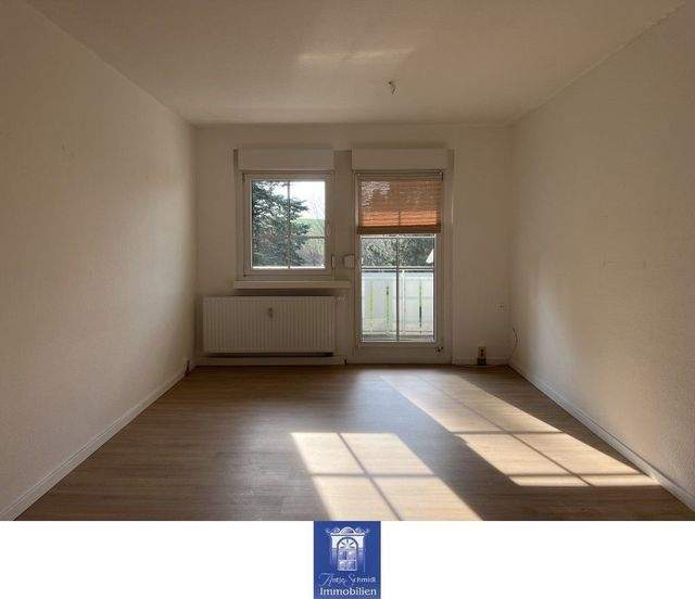 Perfekte Familienwohnung mit schönem Balkon in ländlicher grüner Umgebung! - Photo 1