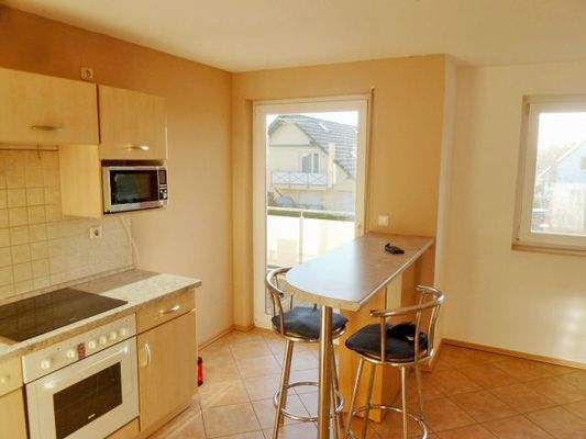 Wohnzimmer mit Küche