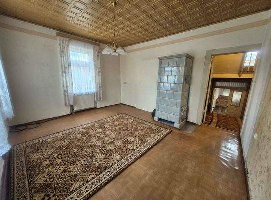 Wohnzimmer mit Kachelofen