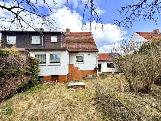 Gartenseite Haus + Garage