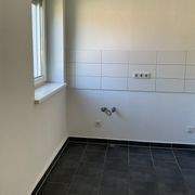 Leere Küche mit Fliesen