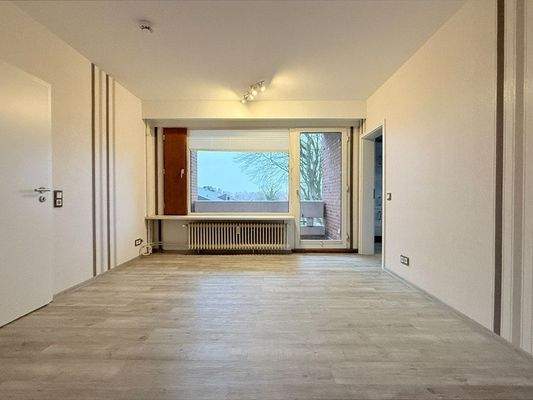 Wohnzimmer mit Zugang zur Loggia