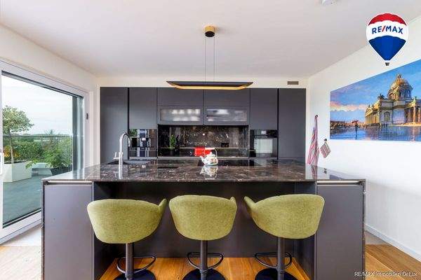 RE/MAX Immobilien DeLux