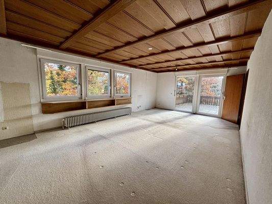 Wohnzimmer mit Zugang zur Terrasse