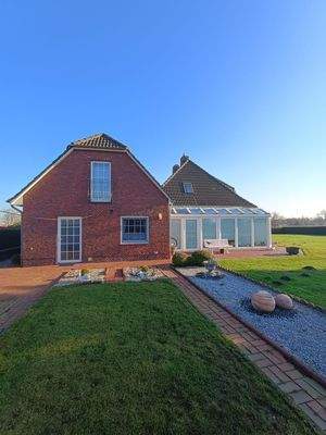 Blick v. Garten Wintergarten mit NG