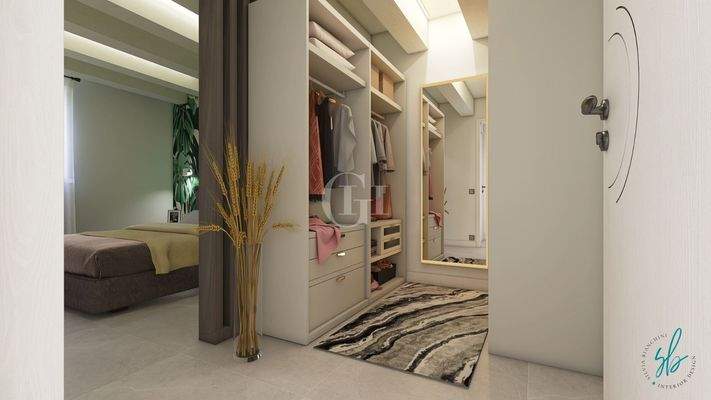 Schlafzimmer mit begehbarem Kleiderschrank