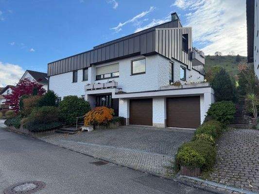 Hausvorder- u. -seitenansicht West