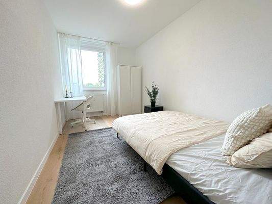 Modernes Zimmer mit Bett