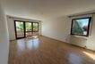 Wohnzimmer mit Balkon