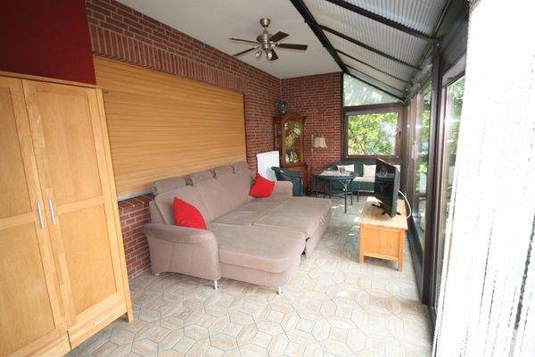 Wohnbereich/beheizter Wintergarten Wohnung 1