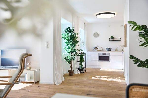 Wohnkonzept mit moderner Küchenlösung (Home Stagin