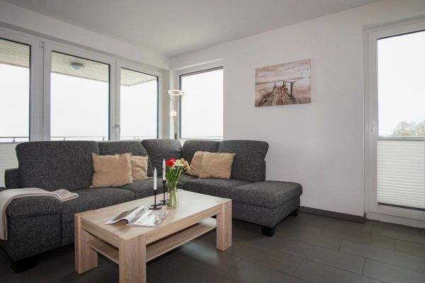 Wohnzimmer mit L-Sofa